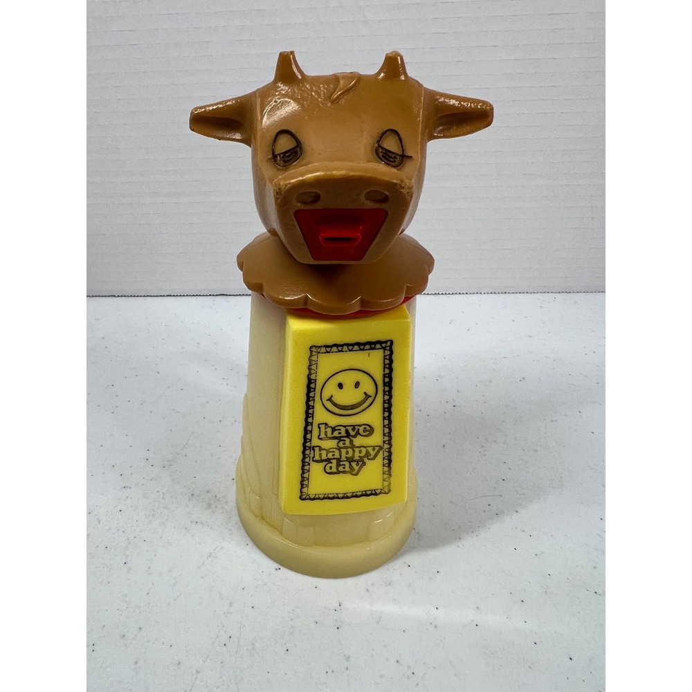 Vintage Whirley Industries Cow bottle Have a Happy Day Smiley Face Plastic Brown